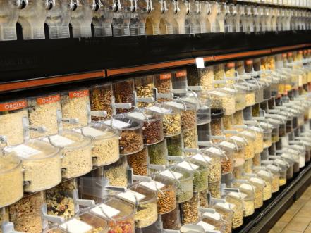 A store displaying many food items mostly seeds