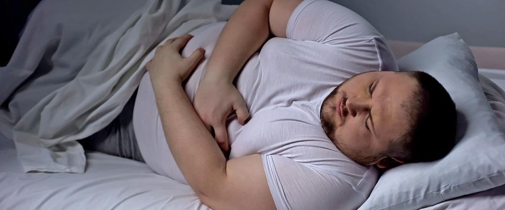 A man sleeping: Weight and sleep quality